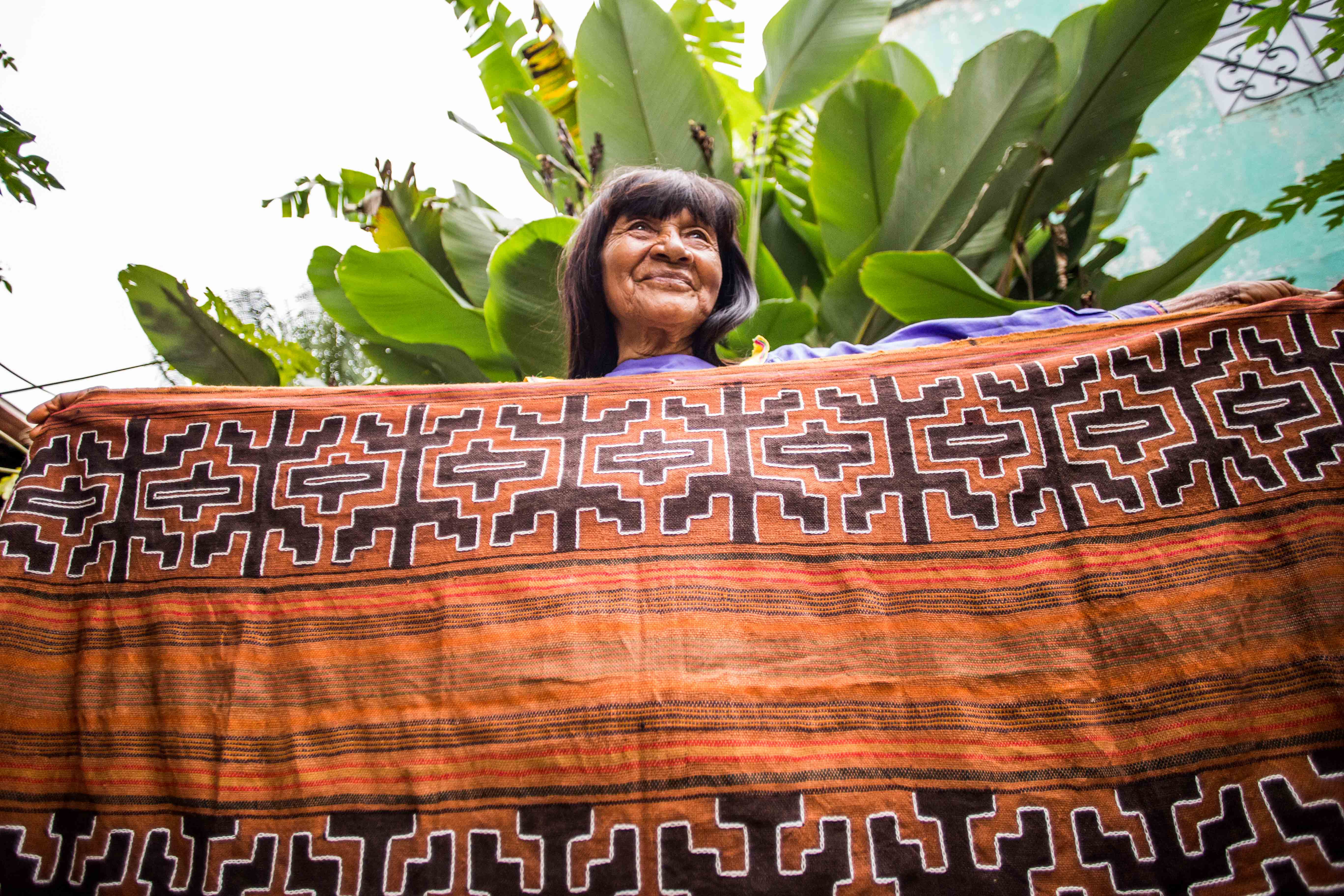 Shipibo textile art with kené patterns